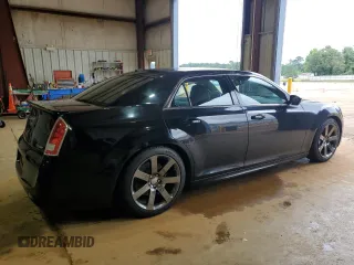 2013 Chrysler 300 SRT-8 z VIN 2C3CCAFJ5DH652791, wystawiony jako Copart lot #55895915 z przebiegiem 146 485 mil mil oraz Szkoda całkowita • Salvage title. Historia ofert i sprzedaży dostępna na DreamBid. Obrazek 3.