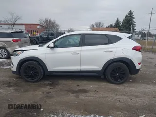 2017 Hyundai Tucson SE with VIN KM8J23A49HU297707, listed as a IAAI auction lot 41257353 with 164,687 mi miles. Bid and sale history available at carsss.com. Image 14.