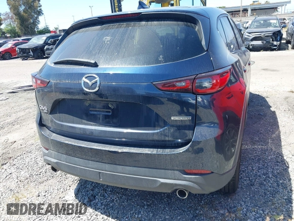 2023 Mazda CX-5 S Premium with VIN JM3KFBDM4P0185865, listed as a IAAI auction lot 42040234 with 32,761 mi miles and . Bid and sale history available at DreamBid. Image 17.