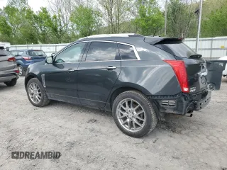 2014 Cadillac SRX Premium Collection with VIN 3GYFNGE3XES560903, listed as a Copart auction lot 52529525 with 117,780 mi miles and Salvage title. Bid and sale history available at DreamBid. Image 2.