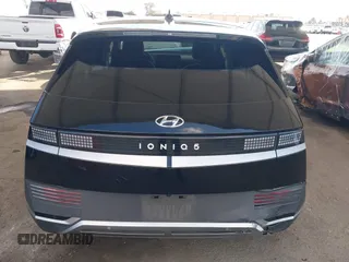 2024 Hyundai Ioniq 5 SE z VIN KM8KM4DE5RU246280, wystawiony jako IAAI lot #41506472 z przebiegiem 15 679 mil mil oraz . Historia ofert i sprzedaży dostępna na DreamBid. Obrazek 16.
