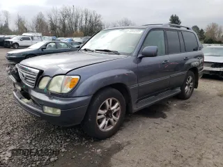 2004 Lexus LX 470 with VIN JTJHT00W443536417, listed as a Copart auction lot 88842505 with 215,692 mi miles and Salvage Title. Bid and sale history available at DreamBid. Image 1.