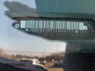 1996 Chevrolet Chevy Van z VIN 1GBFG15M7T1003777, wystawiony jako Copart lot #43272715 z przebiegiem 109 884 mil mil oraz Szkoda całkowita • Salvage title. Historia ofert i sprzedaży dostępna na DreamBid. Obrazek 13.