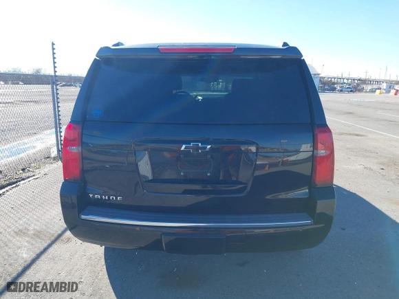 2015 Chevrolet Tahoe LTZ with VIN 1GNSCCKC8FR581994, listed as a IAAI auction lot 41406219 with 187,802 mi miles. Bid and sale history available at carsss.com. Image 16.