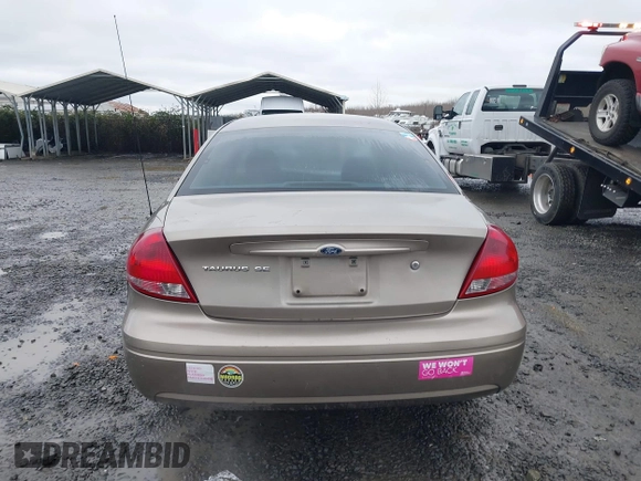 2006 Ford Taurus SE z VIN 1FAFP53U26A197294, wystawiony jako IAAI lot #41506334 z przebiegiem 180 411 mil mil oraz . Historia ofert i sprzedaży dostępna na DreamBid. Obrazek 16.