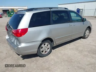 2009 Toyota Sienna CE with VIN 5TDZK23C19S263613, listed as a IAAI auction lot 41983708 with 162,395 mi miles. Bid and sale history available at carsss.com. Image 4.