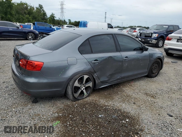2014 Volkswagen Jetta S with VIN 3VW2K7AJ8EM231099, listed as a Copart auction lot 65752605 with 143,010 mi miles and Salvage title. Bid and sale history available at DreamBid. Image 3.