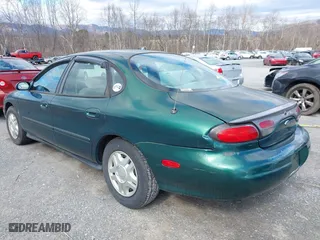 1999 Ford Taurus SE with VIN 1FAFP53S5XA102534, listed as a IAAI auction lot 41740212 with 154,926 mi miles. Bid and sale history available at carsss.com. Image 6.