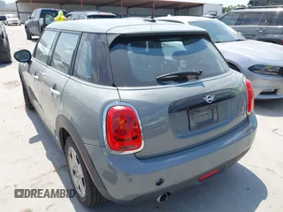2021 MINI Hardtop 4 Door Oxford Edition with VIN WMWXU7C09M2P17351, listed as a IAAI auction lot 42330197 with 51,628 mi miles and . Bid and sale history available at DreamBid. Image 3.