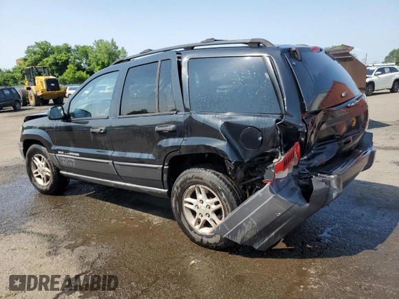 2004 Jeep Grand Cherokee Laredo z VIN 1J4GW48S24C217901, wystawiony jako Copart lot #60436675 z przebiegiem 263 837 mil mil oraz Szkoda całkowita • Salvage title. Historia ofert i sprzedaży dostępna na DreamBid. Obrazek 2.