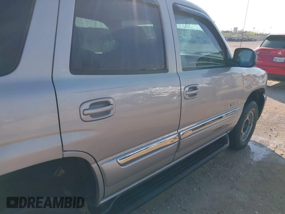 2005 GMC Yukon SLT with VIN 1GKEK13T95R203827, listed as a IAAI auction lot 41815086 with 136,671 mi miles. Bid and sale history available at carsss.com. Image 6.