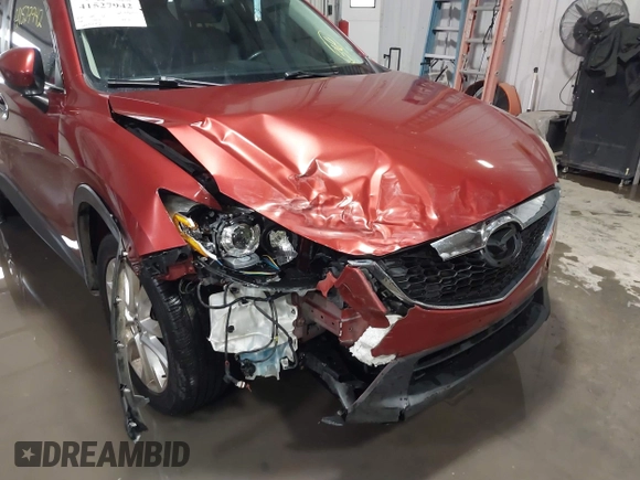 2013 Mazda CX-5 Grand Touring with VIN JM3KE2DE3D0120609, listed as a IAAI auction lot 41527942 with 215,176 mi miles. Bid and sale history available at carsss.com. Image 6.