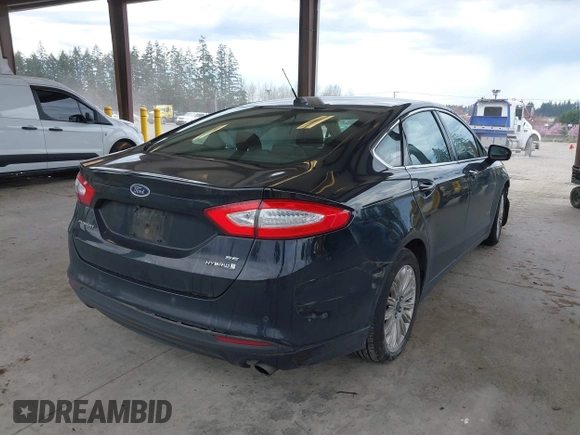 2016 Ford Fusion SE Hybrid with VIN 3FA6P0LU1GR106980, listed as a IAAI auction lot 41895379 with 200,226 mi miles. Bid and sale history available at carsss.com. Image 4.