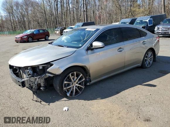 2014 Toyota Avalon Limited with VIN 4T1BK1EB4EU080093, listed as a Copart auction lot 54106595 with 108,995 mi miles and Salvage Title. Bid and sale history available at DreamBid. Image 1.
