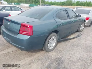2007 Dodge Charger with VIN 2B3KA43G67H874270, listed as a IAAI auction lot 40741338 with 210,415 mi miles. Bid and sale history available at carsss.com. Image 4.