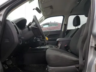 2011 Mazda Tribute Sport with VIN 4F2CY9C70BKM03826, listed as a Copart auction lot 45222665 with 171,082 mi miles and Salvage Title. Bid and sale history available at DreamBid. Image 7.