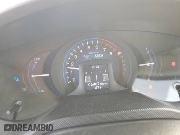 2012 Honda Insight z VIN JHMZE2H32CS000284, wystawiony jako Copart lot #50160335 z przebiegiem 64 074 mil mil oraz Szkoda całkowita • Salvage title. Historia ofert i sprzedaży dostępna na DreamBid. Obrazek 9.