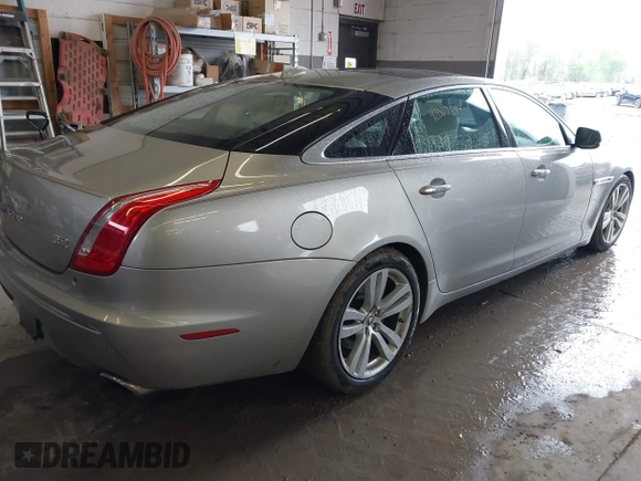 2013 Jaguar XJ Portfolio with VIN SAJWJ2GD0D8V50948, listed as a IAAI auction lot 42067884 with 110,053 mi miles and . Bid and sale history available at DreamBid. Image 4.