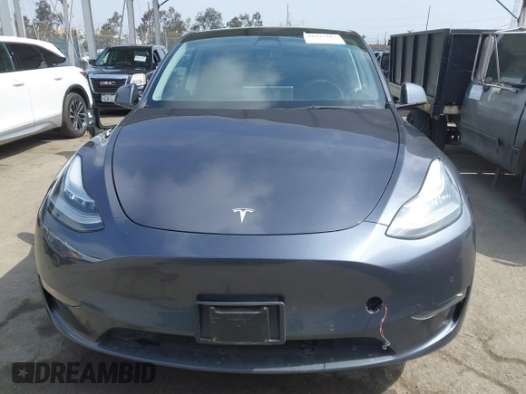 2022 Tesla Model Y Long Range z VIN 7SAYGDEE6NF364994, wystawiony jako IAAI lot #42322587 z przebiegiem 41 572 mil mil oraz . Historia ofert i sprzedaży dostępna na DreamBid. Obrazek 13.