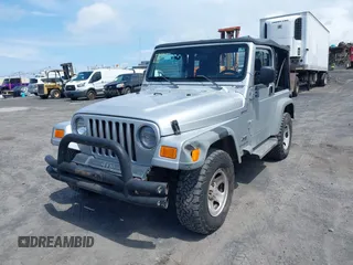 2004 Jeep Wrangler Sport with VIN 1J4FA49S04P781581, listed as a IAAI auction lot 42078693 with 111,123 mi miles and . Bid and sale history available at DreamBid. Image 6.