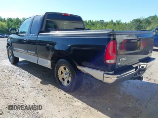 2001 Ford F-150 XL z VIN 1FTRX17WX1NB86721, wystawiony jako IAAI lot #42319610 z przebiegiem 254 826 mil mil oraz . Historia ofert i sprzedaży dostępna na DreamBid. Obrazek 6.