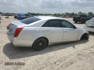 2014 Cadillac CTS AWD with VIN 1G6AW5SX4E0123532, listed as a Copart auction lot 55389825 with 114,807 mi miles and Salvage title. Bid and sale history available at DreamBid. Image 3.