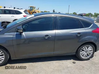2018 Ford Focus Titanium with VIN 1FADP3N28JL232120, listed as a IAAI auction lot 42544070 with 28,661 mi miles and . Bid and sale history available at DreamBid. Image 15.