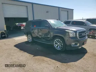 2015 GMC Yukon SLT z VIN 1GKS1BKC5FR689549, wystawiony jako Copart lot #56747385 z przebiegiem 102 856 mil mil oraz Szkoda całkowita • Salvage title. Historia ofert i sprzedaży dostępna na DreamBid. Obrazek 14.