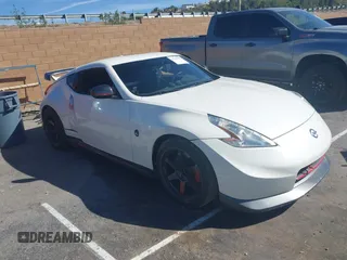 2014 Nissan 370Z Nismo z VIN JN1AZ4EH6EM633413, wystawiony jako IAAI lot #41708381 z przebiegiem Nie podano mil oraz . Historia ofert i sprzedaży dostępna na DreamBid. Obrazek 1.