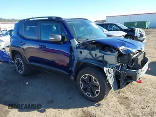 2017 Jeep Renegade Trailhawk z VIN ZACCJBCB5HPE96860, wystawiony jako IAAI lot #41734370 z przebiegiem 113 405 mil mil oraz . Historia ofert i sprzedaży dostępna na DreamBid. Obrazek 1.