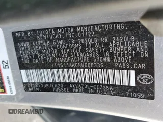 2022 Toyota Camry SE z VIN 4T1G11AK0NU666336, wystawiony jako Copart lot #41667525 z przebiegiem 68 545 mil mil oraz Szkoda całkowita • Salvage title. Historia ofert i sprzedaży dostępna na DreamBid. Obrazek 14.