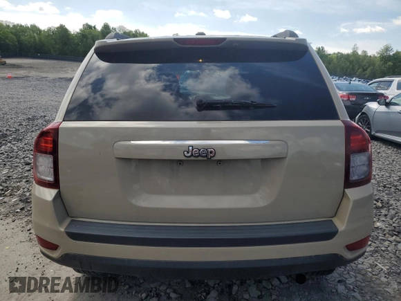 2017 Jeep Compass Sport SE with VIN 1C4NJCBA4HD123119, listed as a Copart auction lot 58787565 with 104,500 mi miles and Salvage title. Bid and sale history available at DreamBid. Image 6.