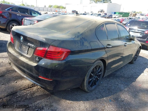 2012 BMW 5 Series 528i with VIN WBAXG5C51CDW85697, listed as a IAAI auction lot 41982244 with 148,744 mi miles. Bid and sale history available at carsss.com. Image 4.