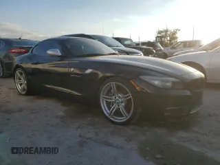 2011 BMW Z4 sDrive35is with VIN WBALM1C56BE633331, listed as a Copart auction lot 73922324 with 0 mi miles and Salvage Title. Bid and sale history available at carsss.com. Image 4.