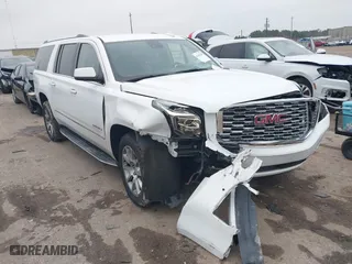 2020 GMC Yukon XL Denali with VIN 1GKS1HKJ2LR170035, listed as a IAAI auction lot 41447285 with 87,118 mi miles. Bid and sale history available at carsss.com. Image 1.
