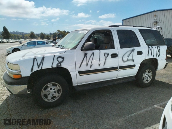 2004 Chevrolet Tahoe LS with VIN 1GNEC13V54J326622, listed as a Copart auction lot 73164854 with 241,083 mi miles and Salvage Title. Bid and sale history available at carsss.com. Image 1.