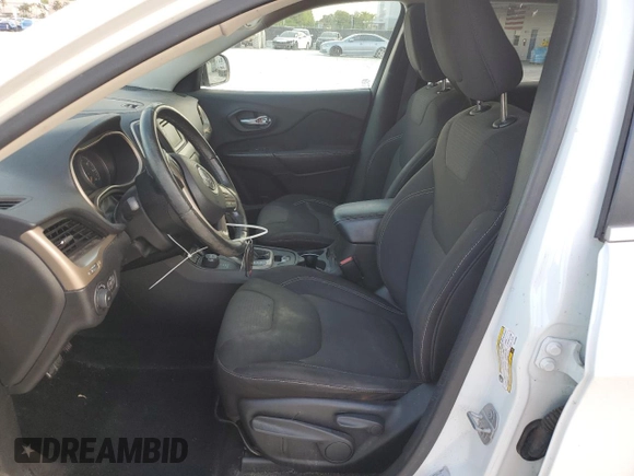 2015 Jeep Cherokee Latitude с VIN 1C4PJMCB2FW734628, выставлен на аукционе Copart как лот 57585295 с пробегом 82 268 миль миль и Списание • Salvage title. История ставок и продаж доступна на DreamBid. Изображение 7.