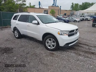 2013 Dodge Durango Crew with VIN 1C4RDJDGXDC693933, listed as a IAAI auction lot 42201796 with 169,051 mi miles and . Bid and sale history available at carsss.com. Image 1.