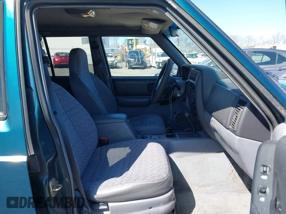 1998 Jeep Cherokee Sport z VIN 1J4FJ68S2WL136129, wystawiony jako IAAI lot #41810918 z przebiegiem 269 989 mil mil oraz . Historia ofert i sprzedaży dostępna na DreamBid. Obrazek 5.
