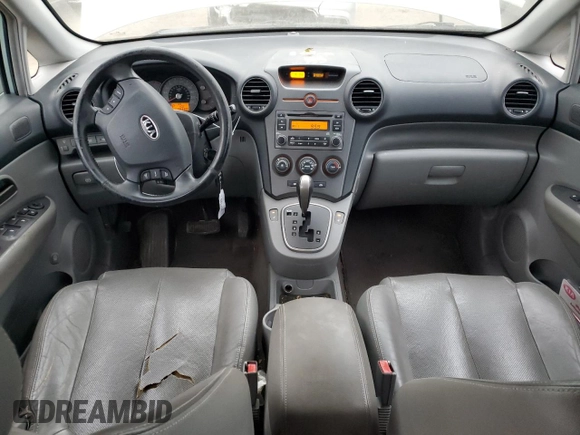 2007 Kia Rondo LX Base with VIN KNAFG525X77093670, listed as a Copart auction lot 87956025 with 138,330 mi miles and Salvage Title. Bid and sale history available at carsss.com. Image 8.