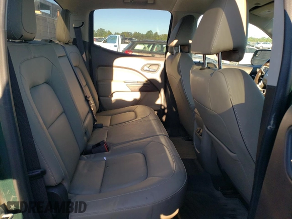 2015 GMC Canyon 4WD SLT with VIN 1GTG6CE35F1246241, listed as a Copart auction lot 74748254 with 126,389 mi miles and Salvage Title. Bid and sale history available at carsss.com. Image 10.