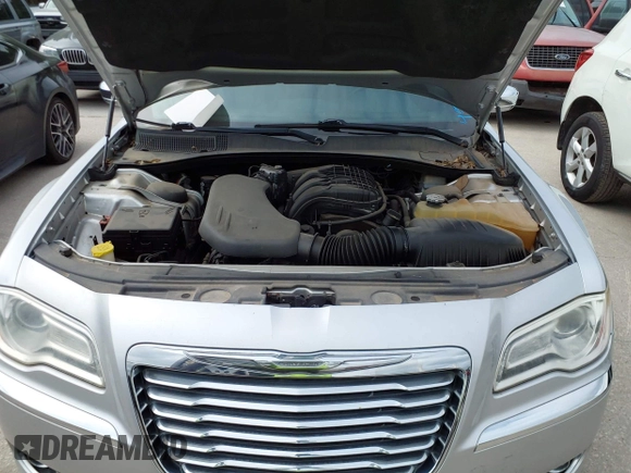 2012 Chrysler 300 Limited with VIN 2C3CCACG9CH223032, listed as a IAAI auction lot 42144147 with 139,625 mi miles. Bid and sale history available at carsss.com. Image 10.