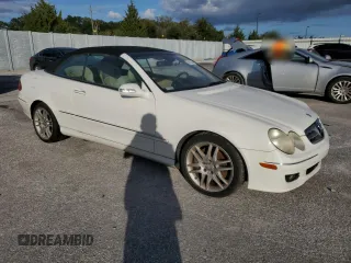 2008 Mercedes-Benz CLK 350 with VIN WDBTK56F28F240335, listed as a Copart auction lot 76526334 with 124,303 mi miles and Salvage Title. Bid and sale history available at DreamBid. Image 4.
