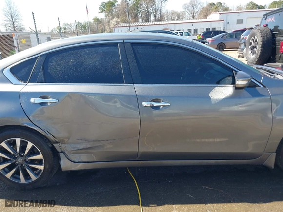 2016 Nissan Altima 2.5 SL with VIN 1N4AL3AP5GC276665, listed as a IAAI auction lot 41753123 with 131,679 mi miles. Bid and sale history available at carsss.com. Image 13.
