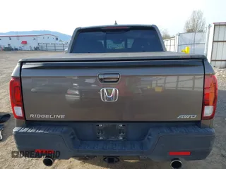 2022 Honda Ridgeline RTL-E with VIN 5FPYK3F7XNB024552, listed as a IAAI auction lot 41998613 with 16,846 mi miles and . Bid and sale history available at DreamBid. Image 16.