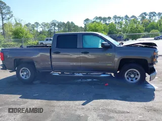 2014 Chevrolet Silverado 1500 Work Truck with VIN 3GCUKPEH0EG262607, listed as a IAAI auction lot 42028522 with 147,379 mi miles and . Bid and sale history available at DreamBid. Image 13.