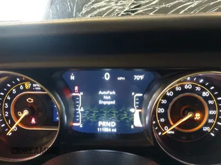 2020 Jeep Gladiator Overland with VIN 1C6HJTFG5LL140142, listed as a IAAI auction lot 42452310 with 111,884 mi miles and . Bid and sale history available at DreamBid. Image 7.