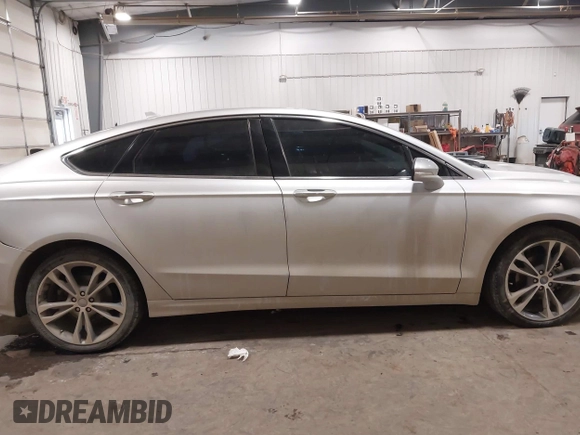 2019 Ford Fusion Titanium with VIN 3FA6P0D9XKR152553, listed as a IAAI auction lot 41603426 with 129,993 mi miles. Bid and sale history available at carsss.com. Image 13.