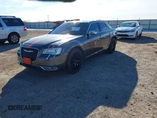 2016 Chrysler 300 with VIN 2C3CCAEG0GH243446, listed as a IAAI auction lot 41376729 with 187,590 mi miles. Bid and sale history available at carsss.com. Image 2.