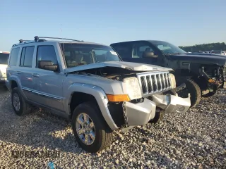 2006 Jeep Commander Limited z VIN 1J8HG58296C170388, wystawiony jako Copart lot #61134795 z przebiegiem 117 992 mil mil oraz Szkoda całkowita • Salvage title. Historia ofert i sprzedaży dostępna na DreamBid. Obrazek 4.